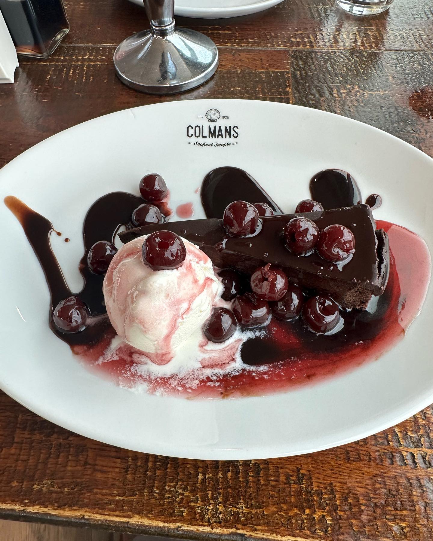 Chocolate and cherry torte, a decadent desert with fresh cherries and ice cream at Colmans Seafood Temple