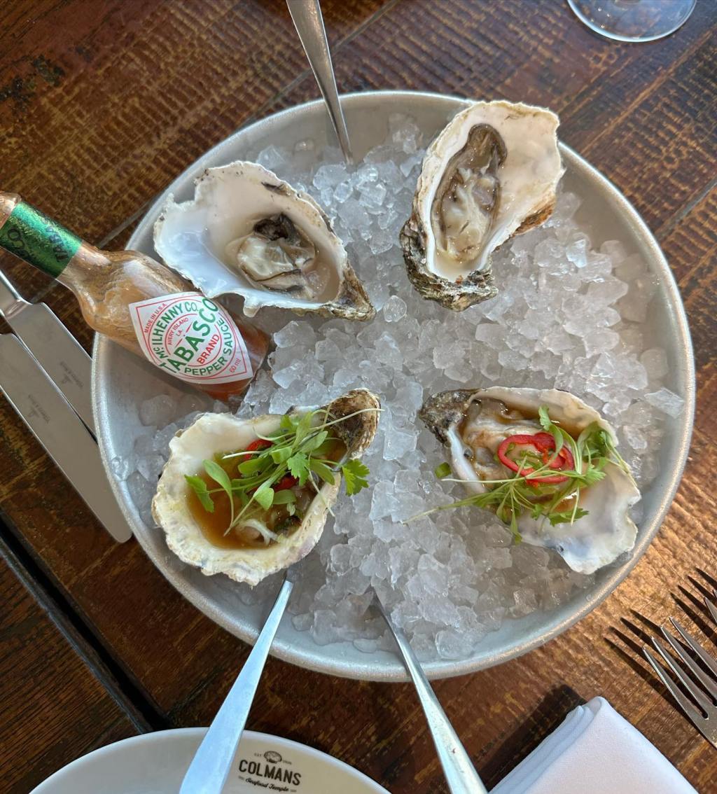 Fresh oysters served with fresh lemon and Tabasco sauce at Colmans seafood temple