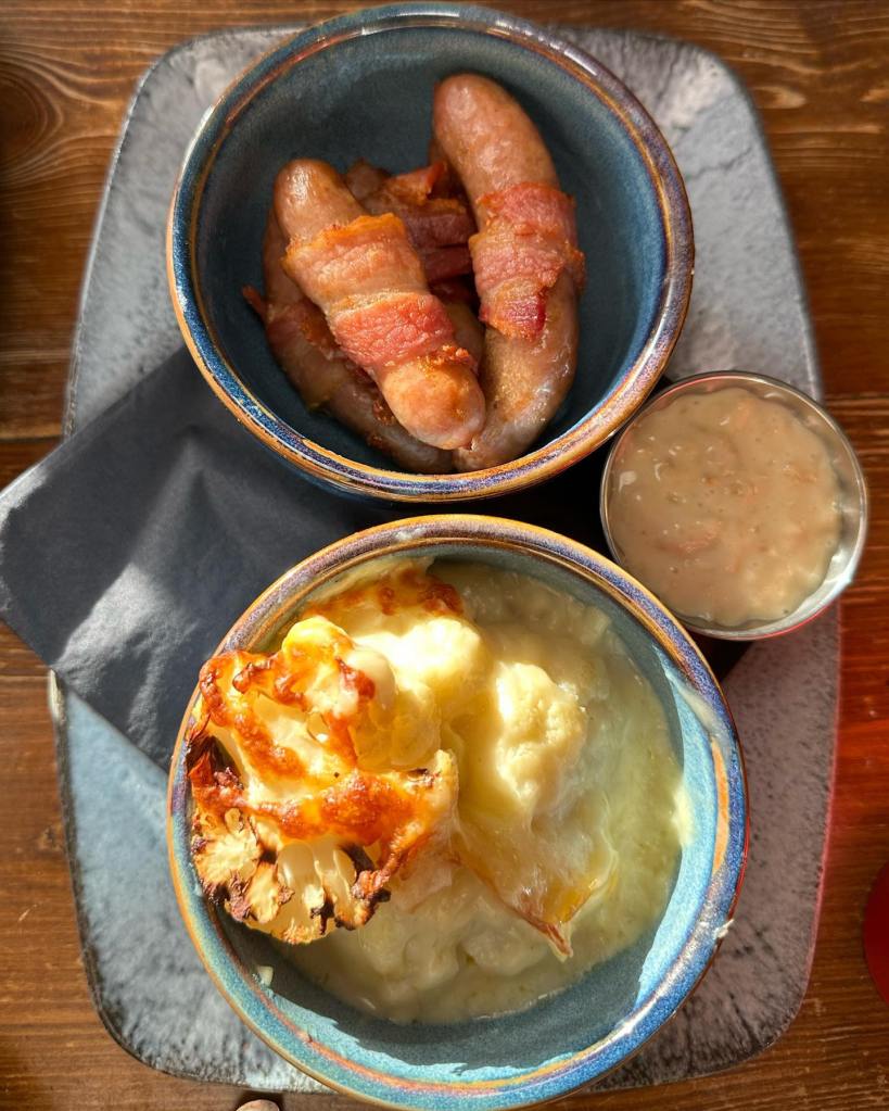 Cauliflower cheese and pigs in blankets at Cog and Wheel