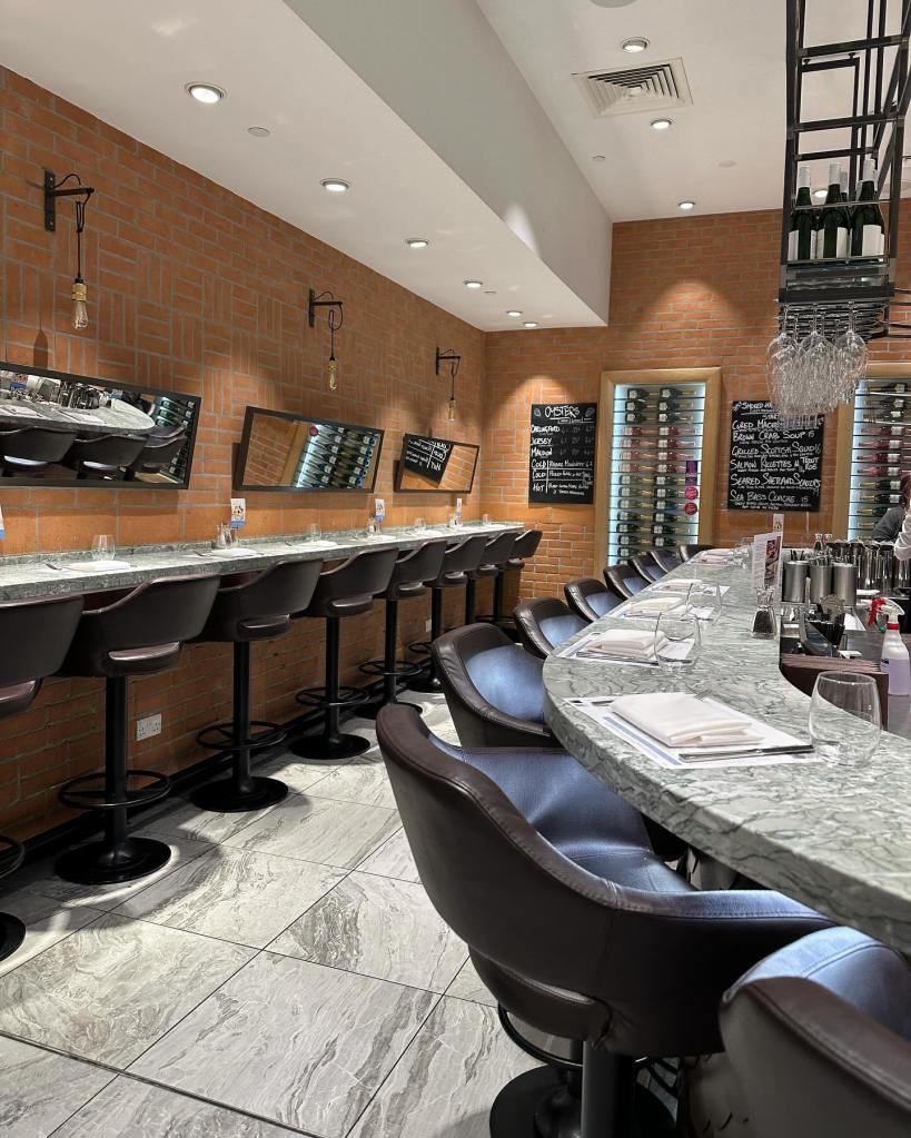 Chic and inviting interior of Saltwater Fish Company within Fenwick’s Food Hall, Newcastle, featuring modern decor and a relaxed atmosphere