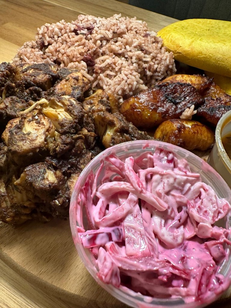 Delicious shredded jackfruit from Lev's Caribbean Kitchen, showcasing authentic Jamaican flavors