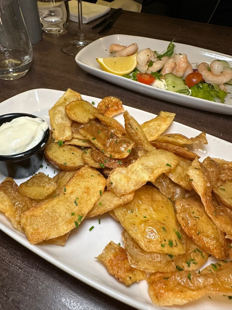 Derwent Manor Hotel Open Kitchen Concept – Chefs preparing food in the open kitchen at Derwent Manor Hotel, showcasing their pizza oven and lively atmosphere