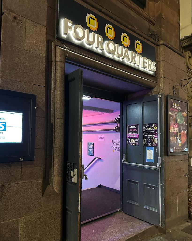 The vibrant and lively atmosphere of Four Quarters, Newcastle's original arcade bar, showcasing the unique arcade games and decor