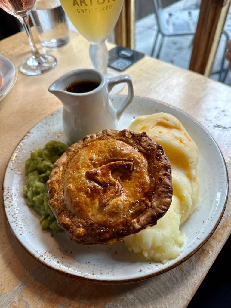 Delicious vegan mince pie from The Redhouse, featuring a flaky crust and rich, flavorful filling