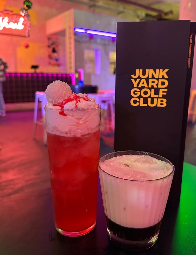 Festive cocktails including Who Killed Santa? and Junkyard Punch at Junkyard Golf Club, showcasing colorful and inventive drinks