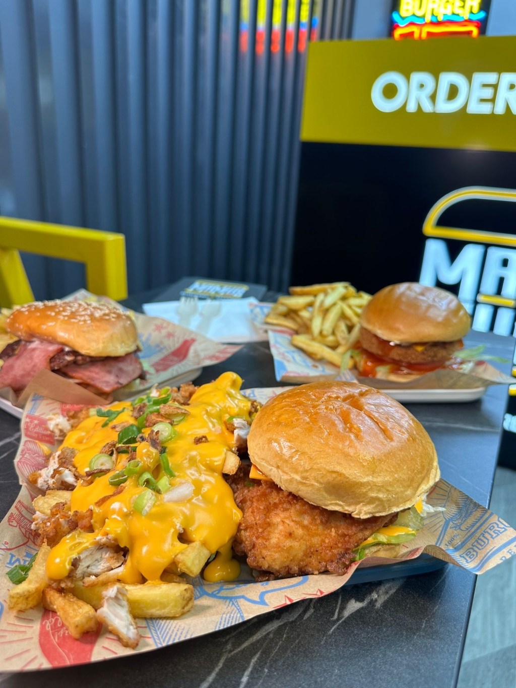 Blazing Chick Burger: The Blazing Chick burger with golden buttermilk fried chicken, garnished with spicy sauce