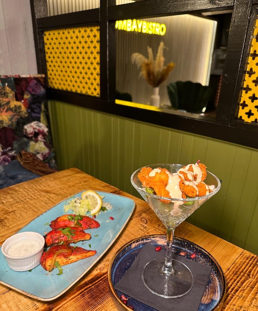 Delicious Kaju Prawns, perfectly cooked and lightly battered, showcased at My Bombay Bistro, also Generous portion of flavorful Chicken Tikka served as a starter at My Bombay Bistro