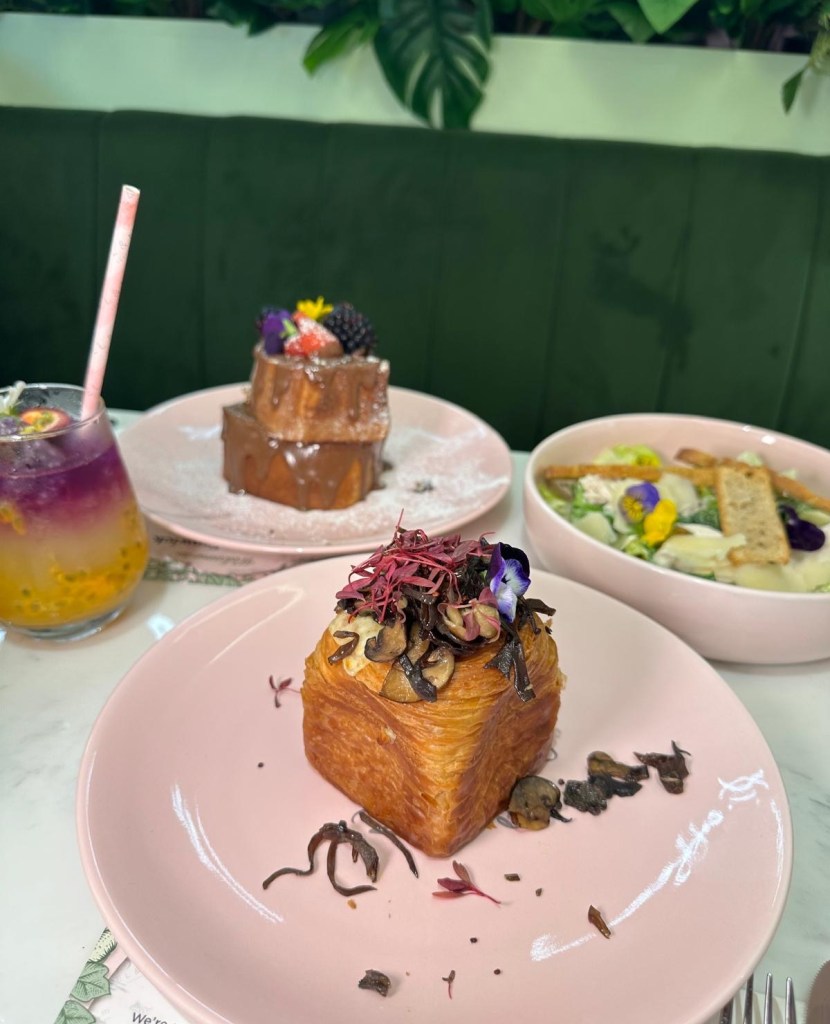 Mushroom & Cheese Melt Cube: A square-shaped, golden-brown pastry filled with melted cheese and mushrooms, served warm