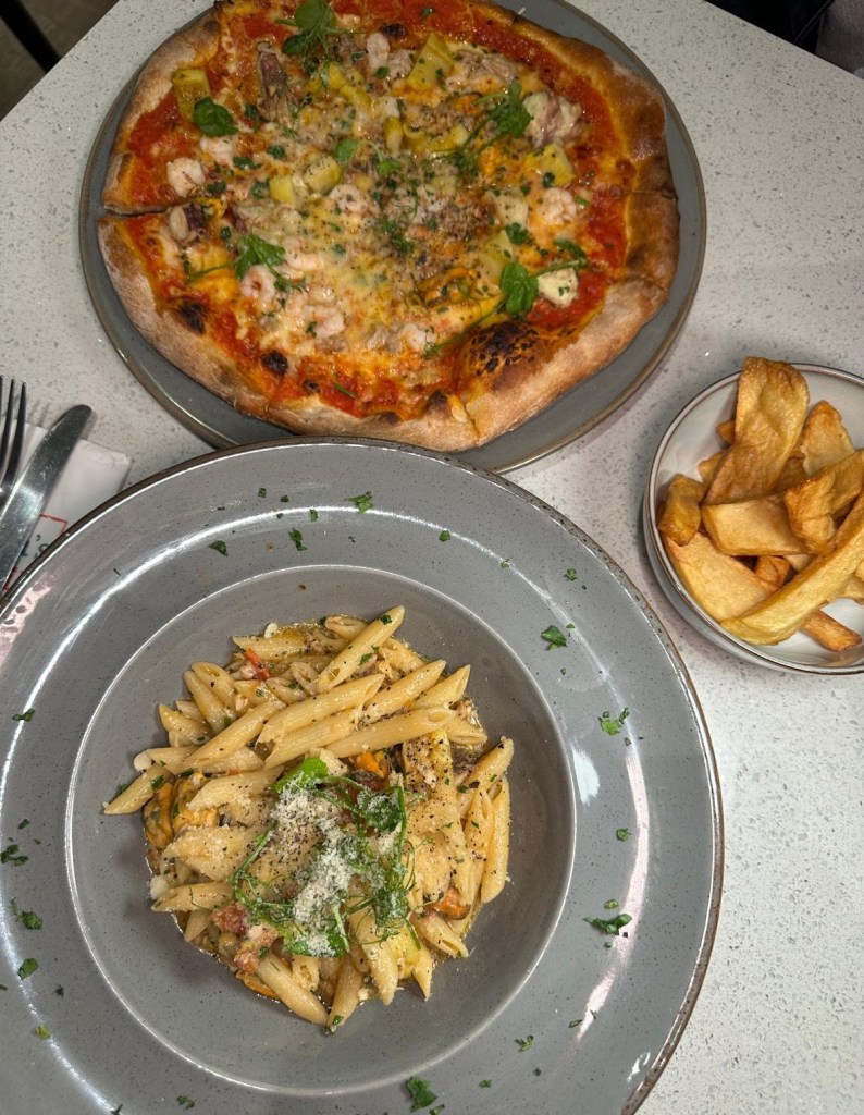 Frutti di Mare Pasta: Generously loaded Frutti di Mare Pasta with fresh seafood, including octopus Calamari mussel , and a hearty Italian main course Pizza Pescaro: Seafood pizza topped with perfectly cooked seafood and a hint of spice at Mamas Bar and Grill, ideal for seafood lovers