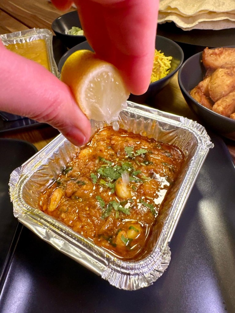 Spiced prawns in a rich tomato bhuna sauce, served with soft, fried puree bread.