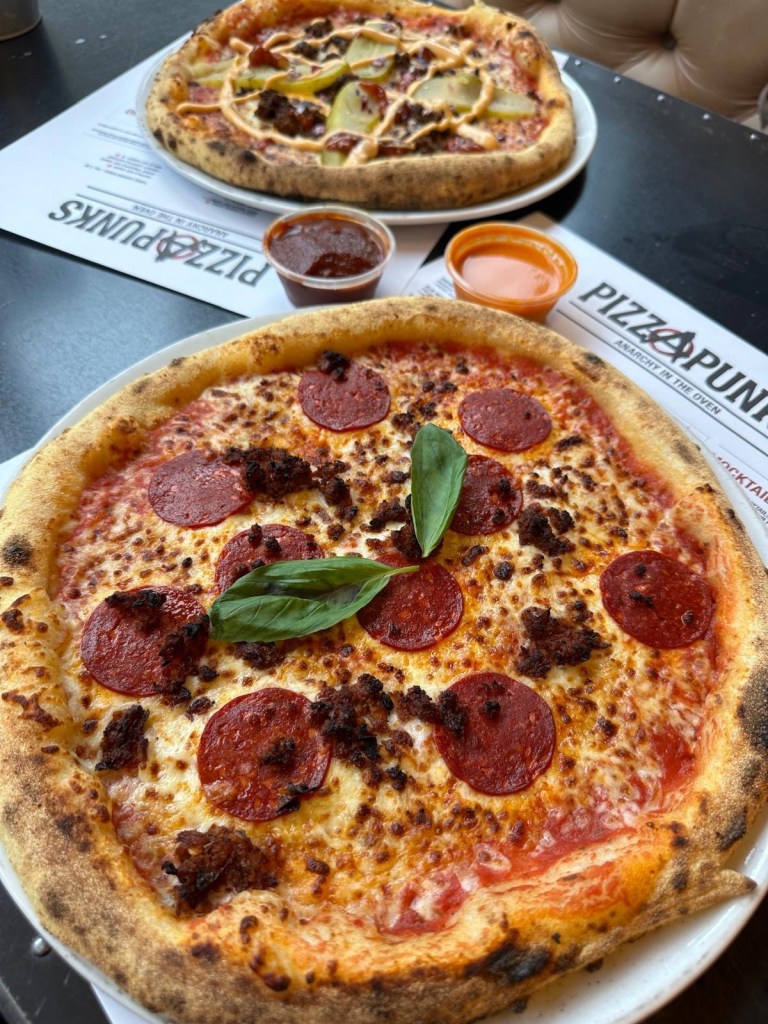 Pepperoni & Nduja Pizza: A flavorful pepperoni and nduja pizza with a bold umami taste, topped with spicy Italian sausage and pepperoni on a perfectly crafted sourdough crust.