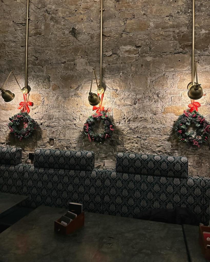 Stylish interior of Tickets bar in Newcastle with Victorian-inspired decor and cozy lighting