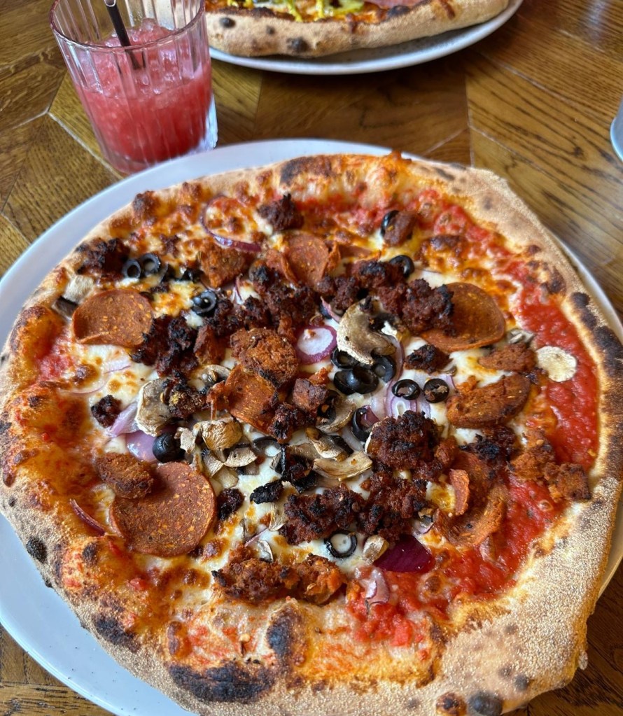 Cheeseburger Pizza: A deliciously indulgent cheeseburger pizza featuring a combination of beef patty, melted cheese, pickles, and all the familiar flavors of a cheeseburger on a fresh, sourdough pizza base.