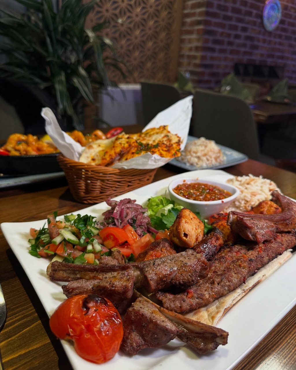 Saray Mixed Grill featuring marinated lamb, chicken breast, lamb chops, ribs, and adana with rice, salad, and chili sauce at Saray Turkish Restaurant, Jesmond