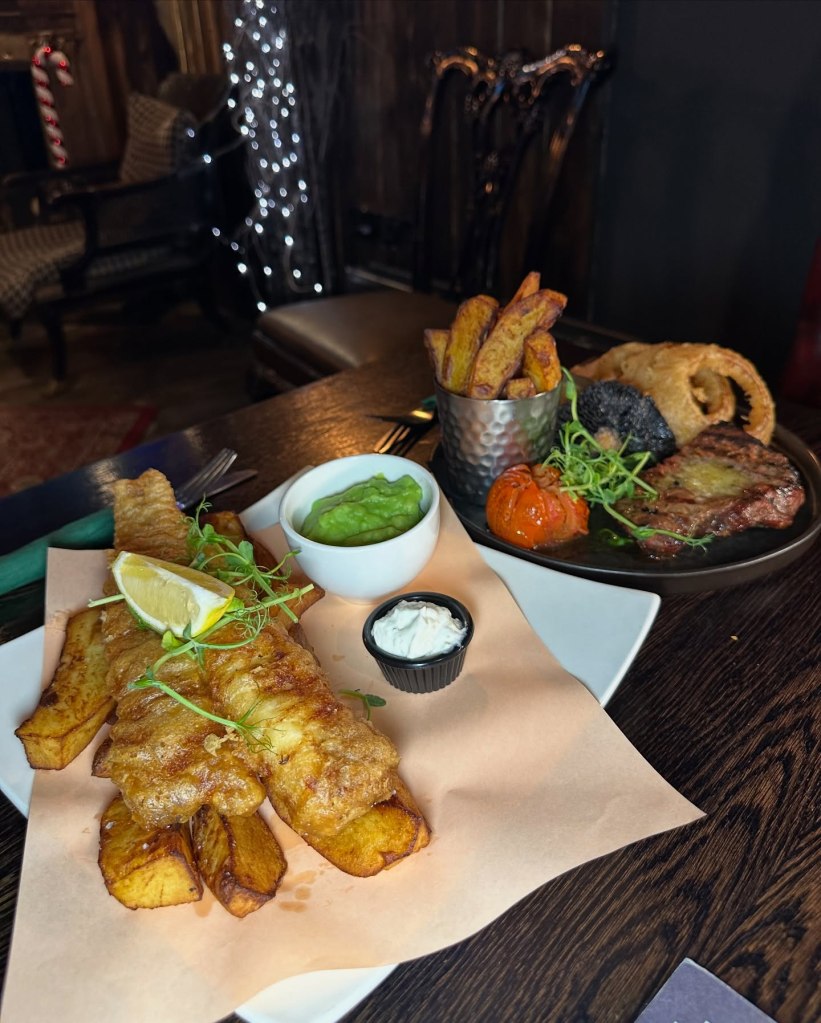Golden fish and chips at Sticky Wicket, served with chunky chips, mushy peas, and tangy tartar sauce. 8oz sirloin steak at Sticky Wicket, served with hand-cut chips, chargrilled tomato, mushroom, crispy onion rings, and peppercorn sauce