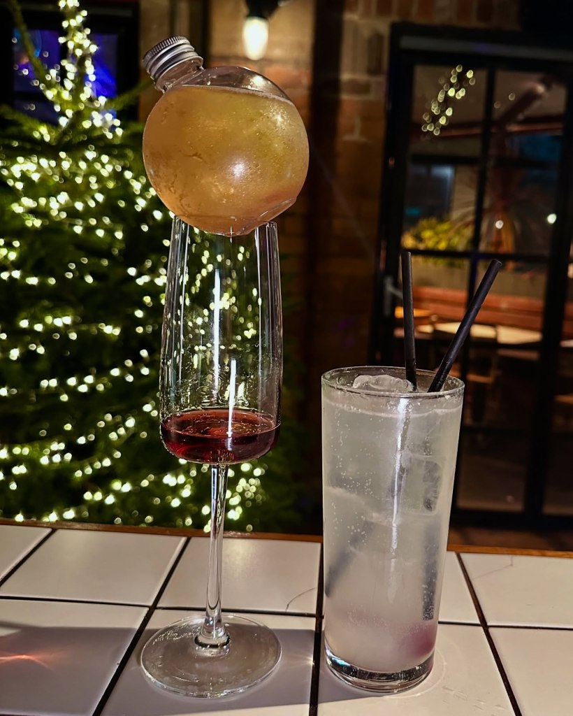 Tinsel Royale cocktail with Chambord, prosecco, and glitter at Horticulture.