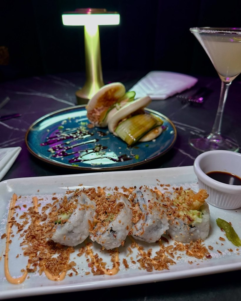 Dynamite Roll with prawn tempura and Chicken Teriyaki Bao served together.