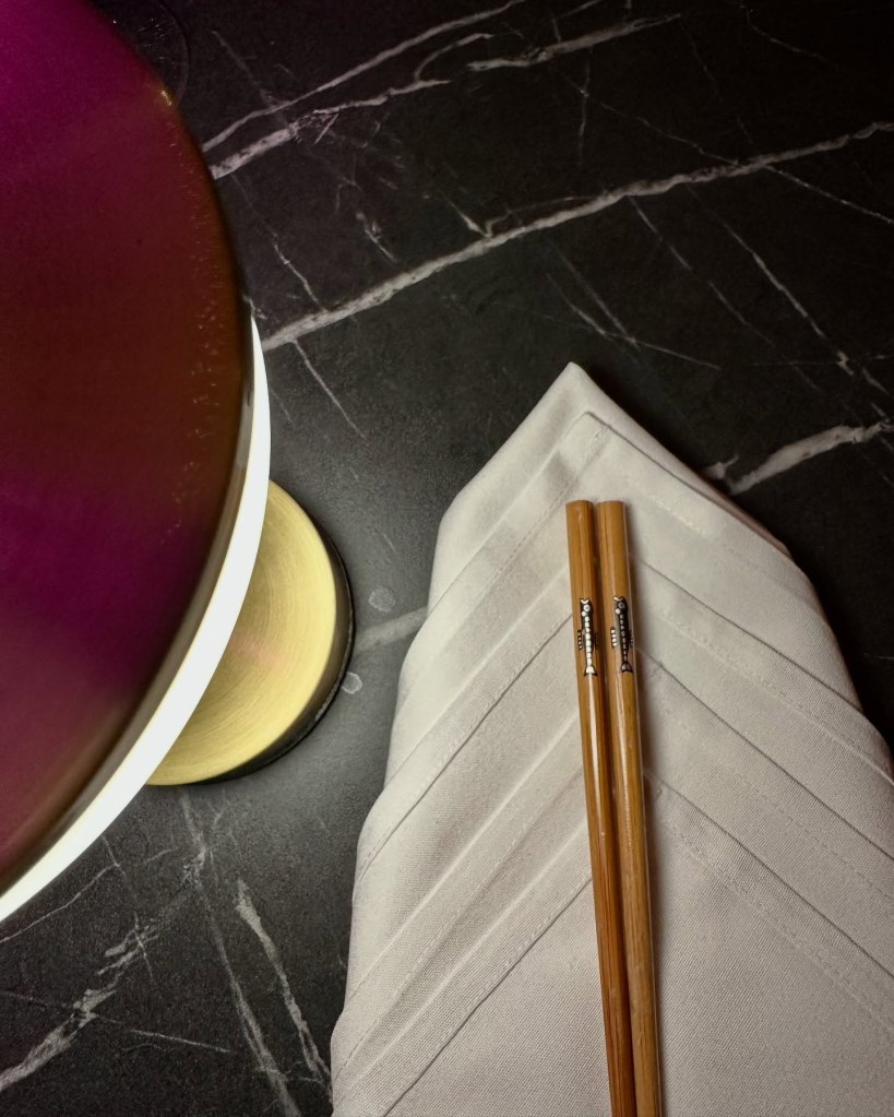 Cozy booths in a beautifully decorated dining area at Ziiza Lounge and Grill.