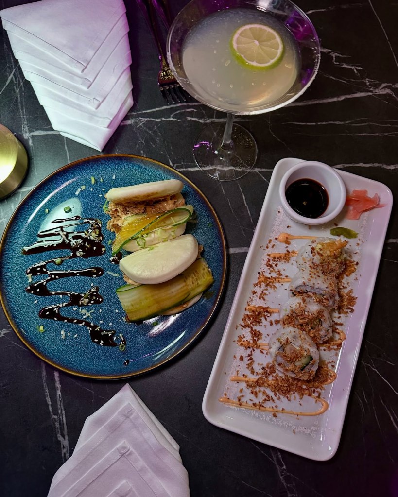 Dynamite Roll with prawn tempura and Chicken Teriyaki Bao served together.