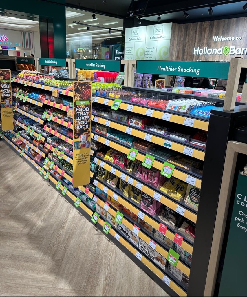 A selection of Grenade bars, Nakd protein bars, and Holland & Barrett’s own flapjacks, perfect for on-the-go snacking.