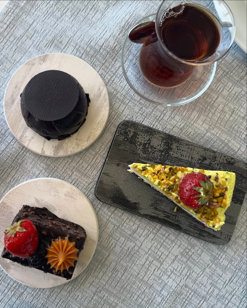 An array of dishes at TUI Blue Seno, including Turkish meze platters, fresh seafood, and vibrant international cuisine served in a scenic al fresco dining area.