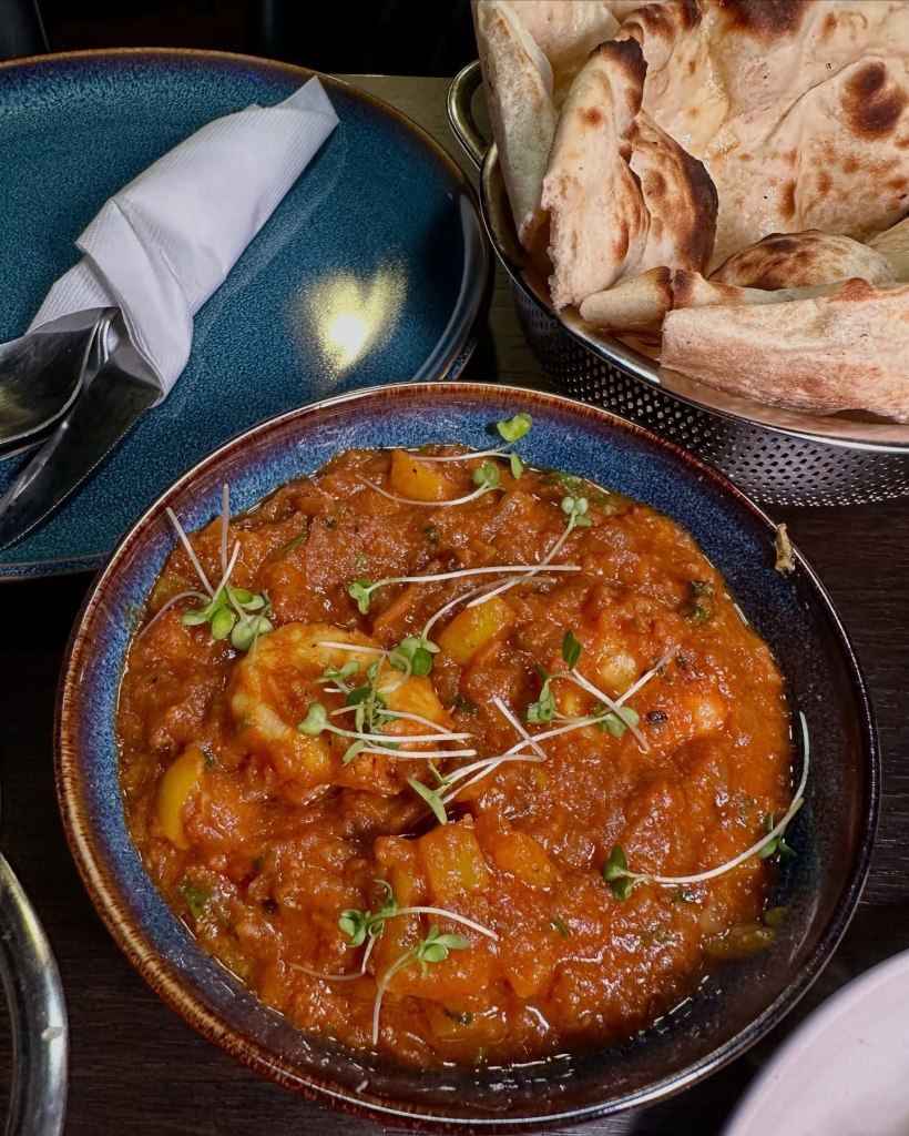 Prawn Pataka dish from Sanskrit, featuring perfectly cooked prawns in a flavorful masala spice blend