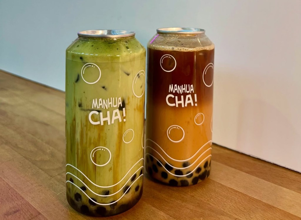 A tall can of brown sugar matcha latte with swirls of creamy matcha and rich brown sugar, topped with chewy brown sugar pearls, sealed for freshness. A sleek can of brown sugar latte, layered with creamy milk and golden brown sugar syrup, finished with classic tapioca pearls
