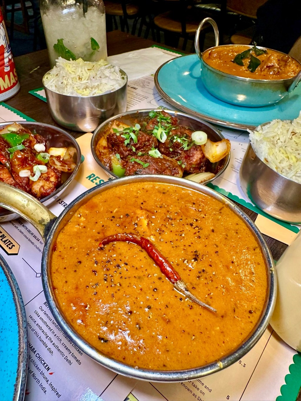 Butter Chicken 1950s, rich and creamy, served with tandoori roasted chicken tikka in a tomato-based sauce