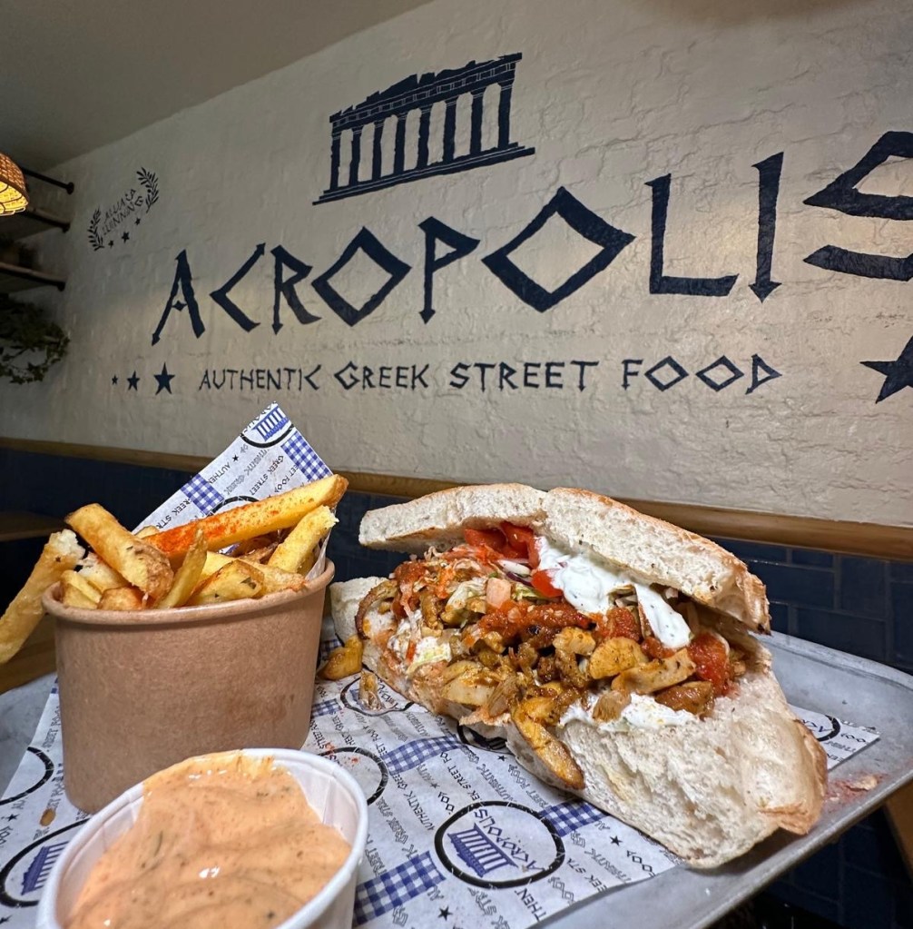 A Geordie Gyros featuring tender grilled chicken or halloumi, crisp salad, and Acropolis’ signature sauce, all wrapped in a soft, floury stottie.