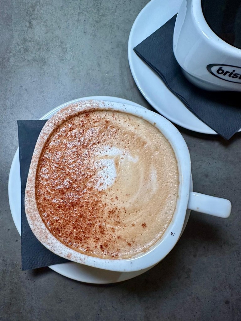 Creamy cappuccino with a layer of frothy milk and coffee