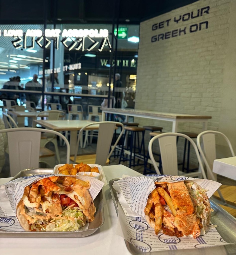 Gyros wraps—Chicken Gyros, Halloumi Gyros, and the unique Geordie Gyros—served with crisp salad, fluffy fries, and rich, flavorful sauces.