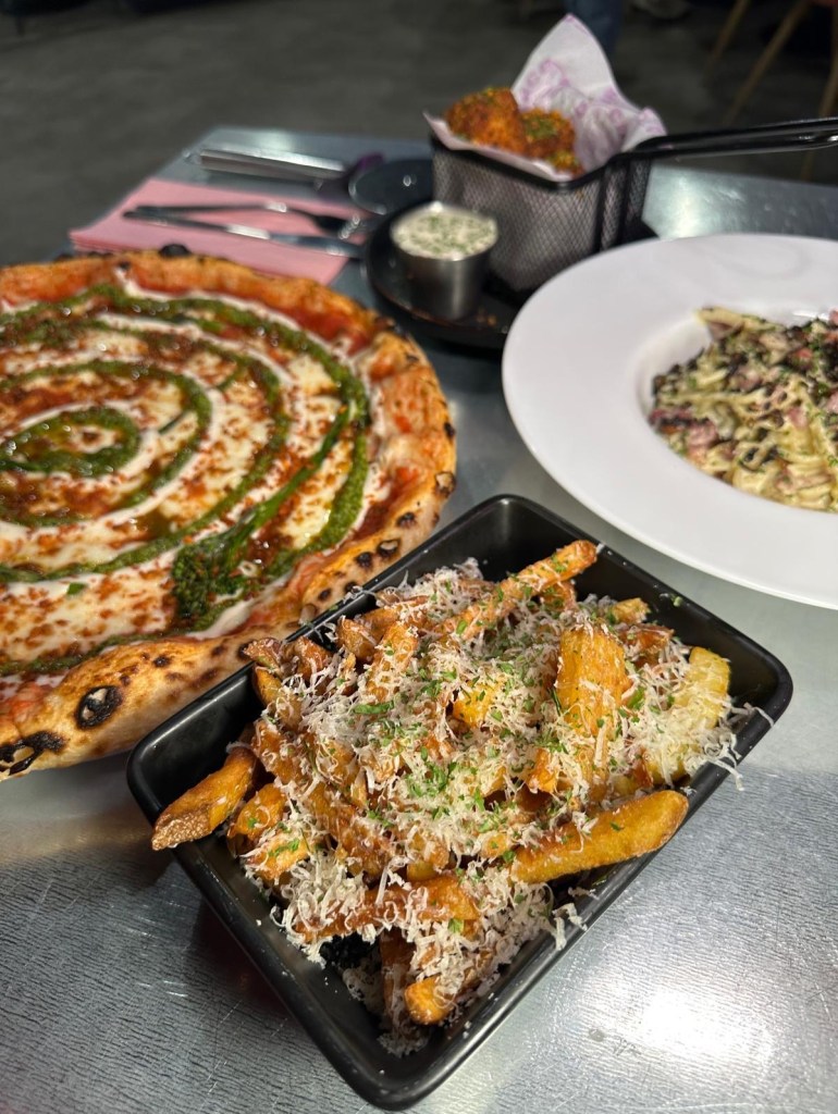 Truffle Fries served in a stylish basket at Circo Italian