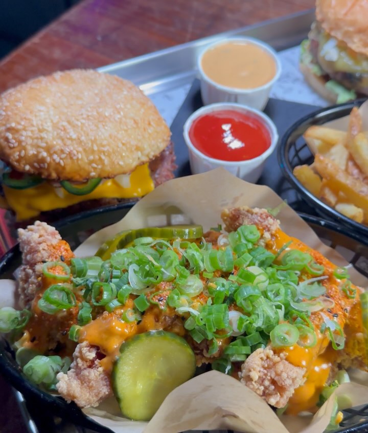 Japanese-style fried chicken with green onions, house pickles, Korean buffalo mayo, Sichuan oil, and togarashi.