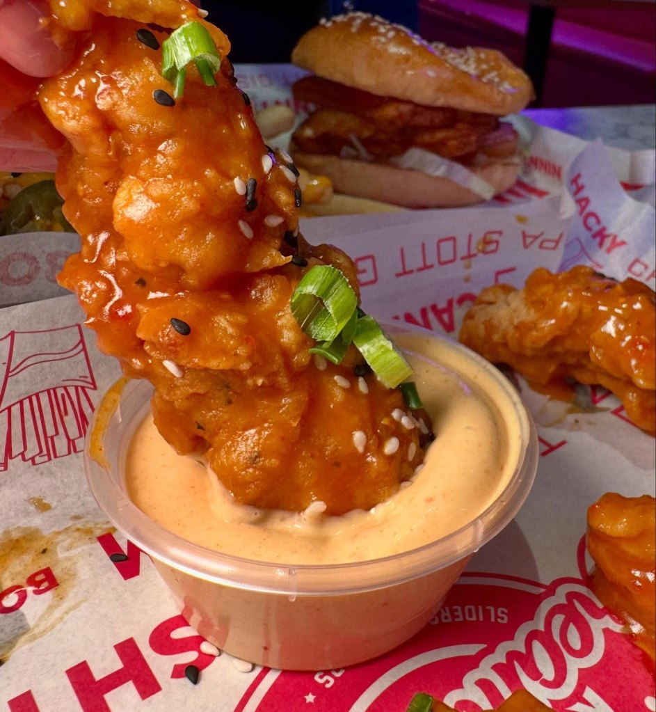 Crispy boneless chicken tenders coated in spicy sauce, served fresh at Dream Burger