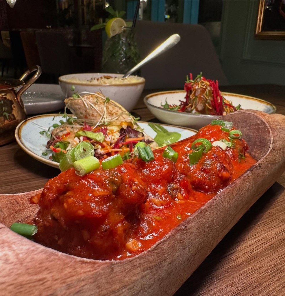 Indo-Chinese style vegetable Manchurian in a rich house sauce at Chakh Dhoom.