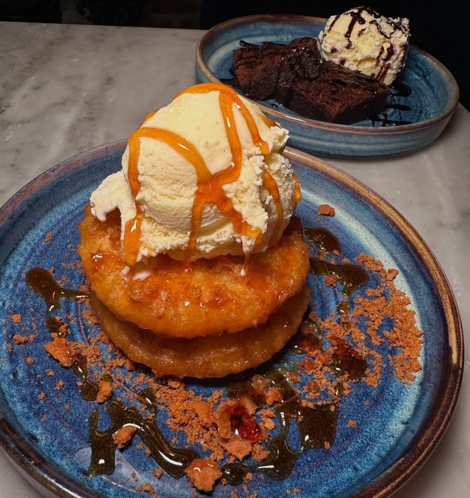 Deep-fried pineapple split with a light, crispy batter at Fisherman’s Bay.