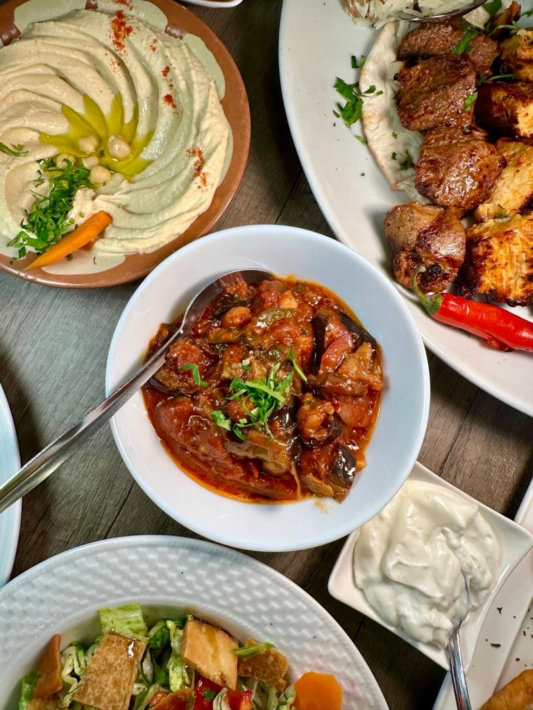 Lebanese moussaka with baked aubergine, tomato, onion, chickpeas, and sweet peppers