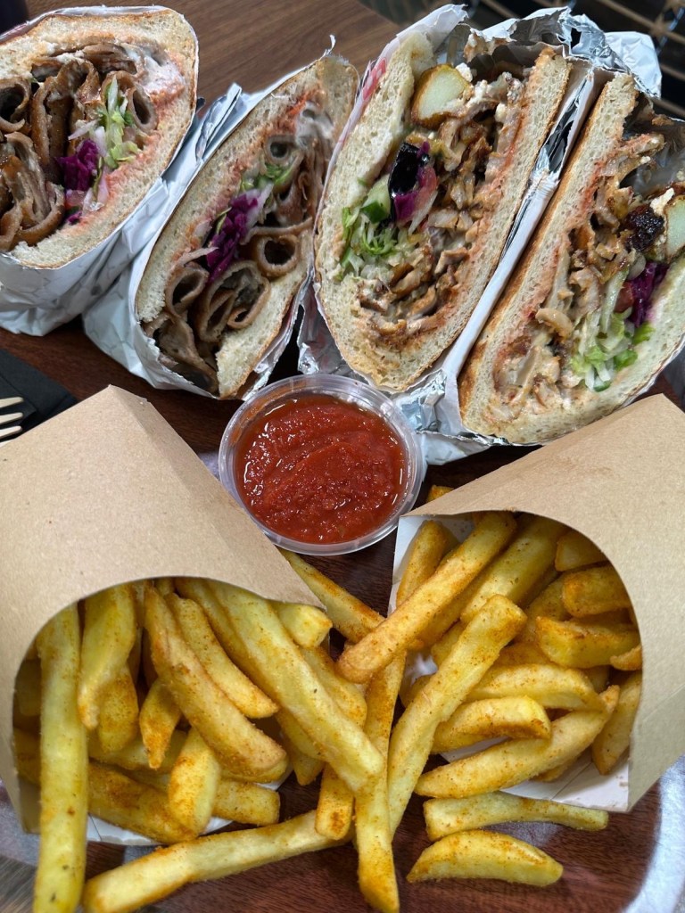 Flame-grilled Turkish and German doner kebabs served with seasoned fries