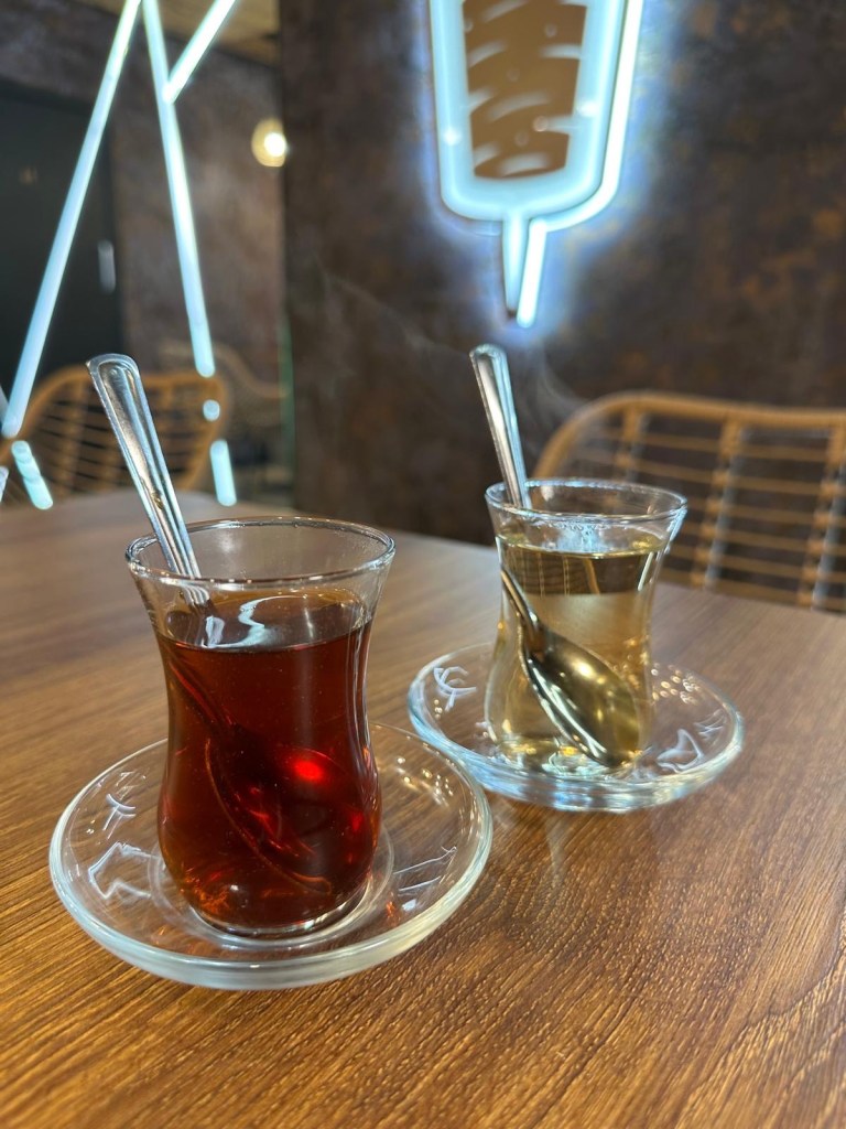 Traditional Turkish apple tea served in a glass