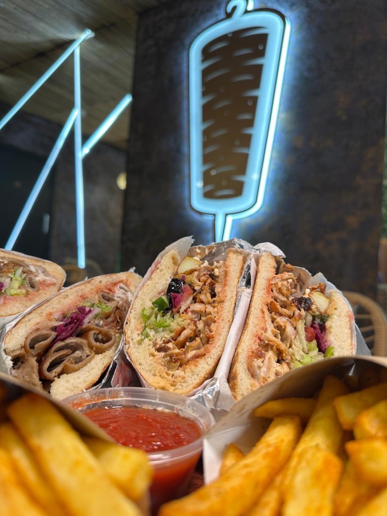 Flame-grilled Turkish and German doner kebabs served with seasoned fries