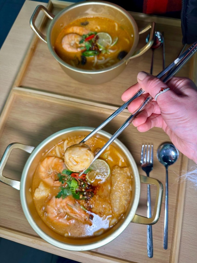 The Weis Malatang menu in Eldon Square offers a range of broth bases, fresh seafood, meats, vegetables, and noodles, allowing you to build your perfect Malatang bowl. Prices are listed for easy selection.