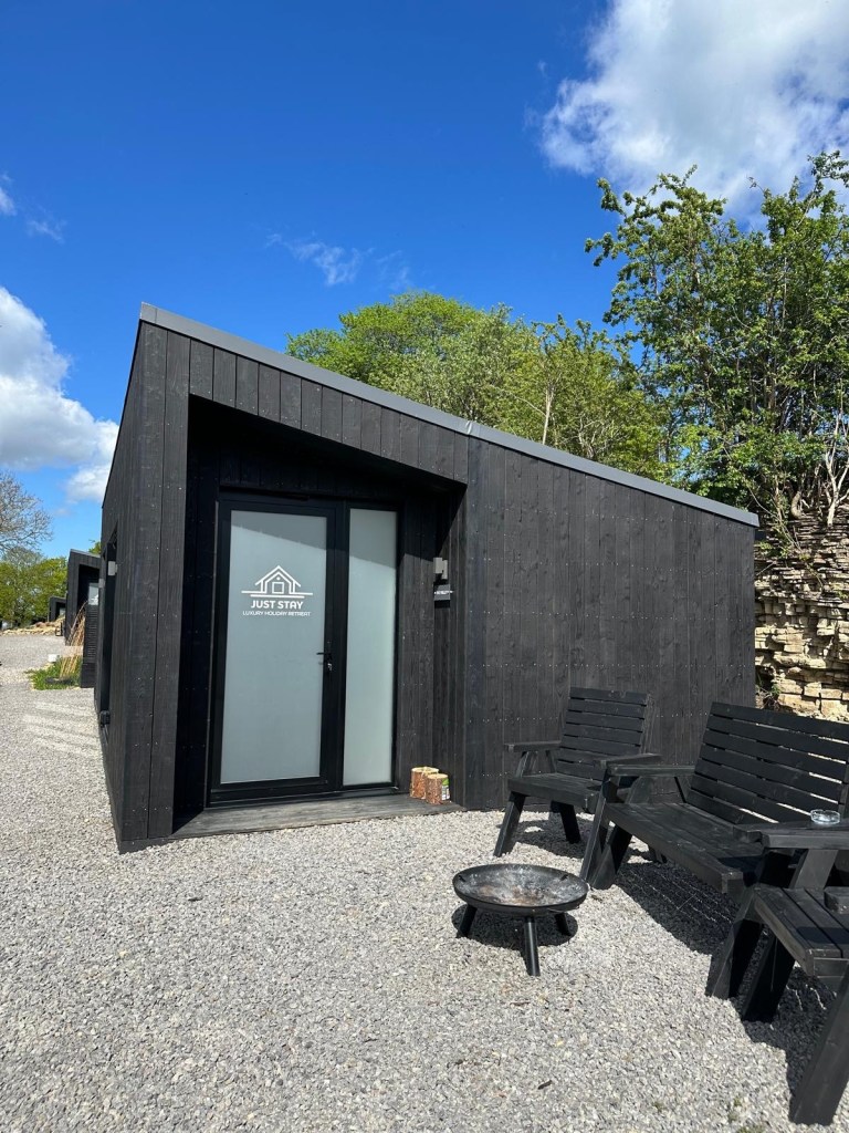 Stylish countryside lodge with private hot tub and scenic views at High Hill Stay near Newcastle.