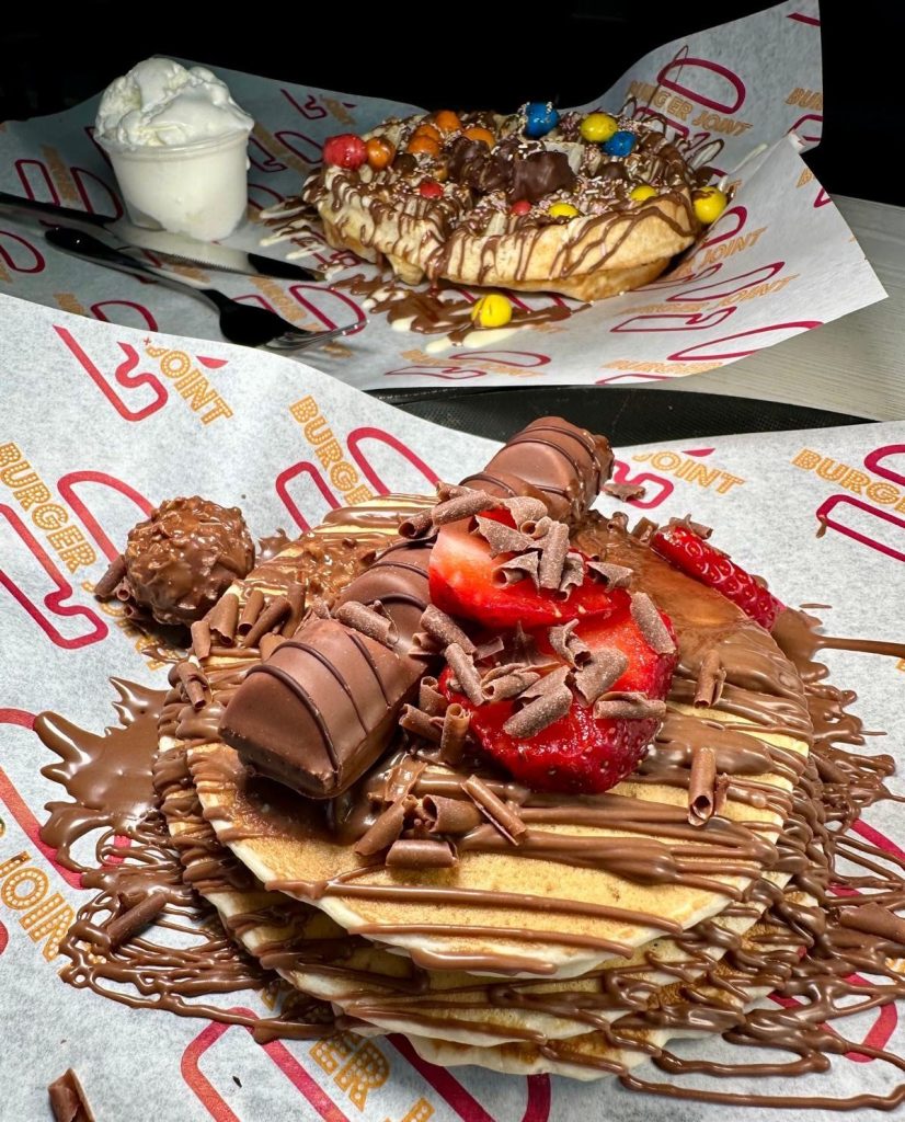 Craft Burger’s American Dream waffle and Ferrero Kinder pancakes loaded with chocolate and toppings.