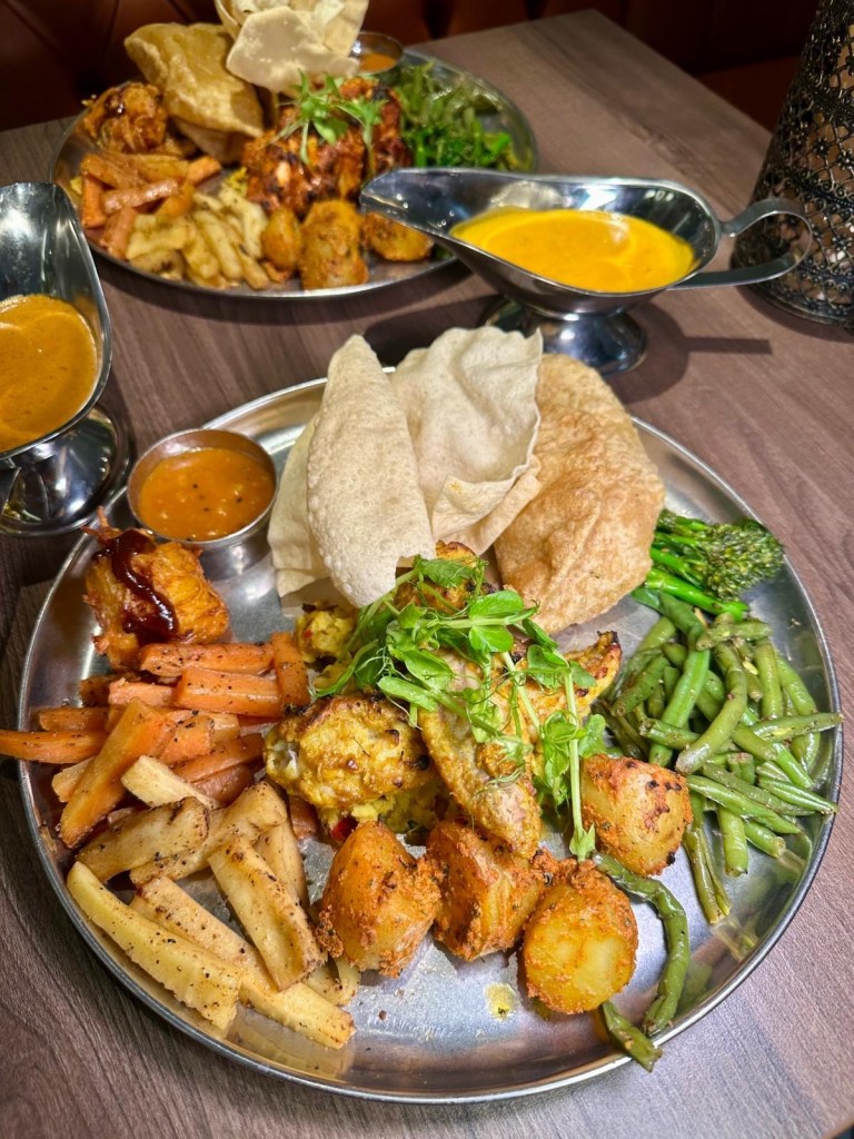 Tandoori spiced chicken and monkfish Sunday roast with Indian-inspired sides at Chakh Dhoom