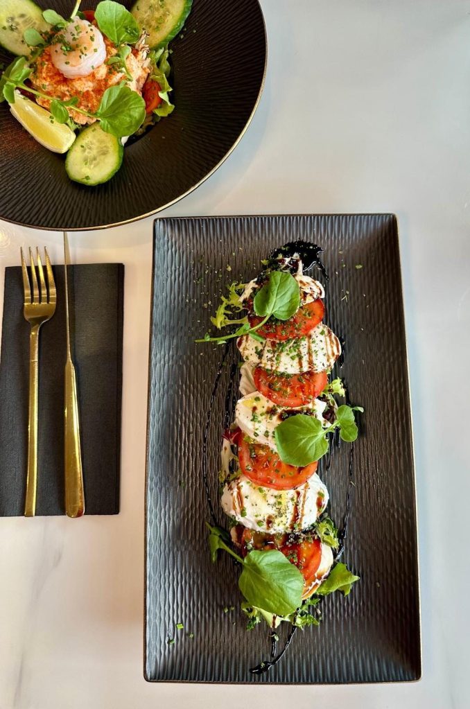 Fresh Caprese salad with buffalo mozzarella, vine tomatoes, and basil at Wyvestow’s South Shields