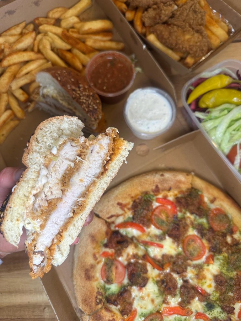 Caspian Kebab’s Kiev Bolognese pizza, peri peri chicken burger, and hot honey chicken tenders served with fries.
