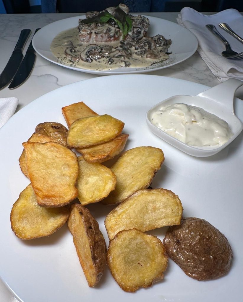 Golden crispy potato skins at Da-Zero Italian restaurant