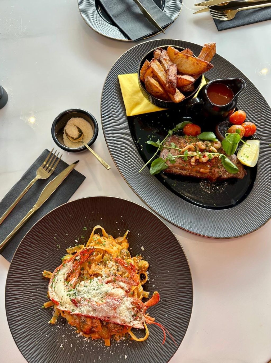 Wyvestow’s main dishes including Bloody Mary Lobster Pasta with half lobster and 10oz sirloin steak with golden chips and seafood butter sauce