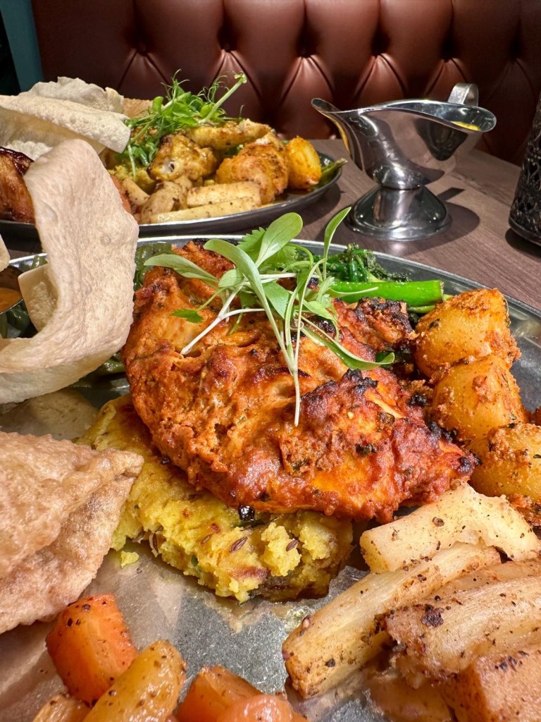 Tandoori spiced chicken and monkfish Sunday roast with Indian-inspired sides at Chakh Dhoom