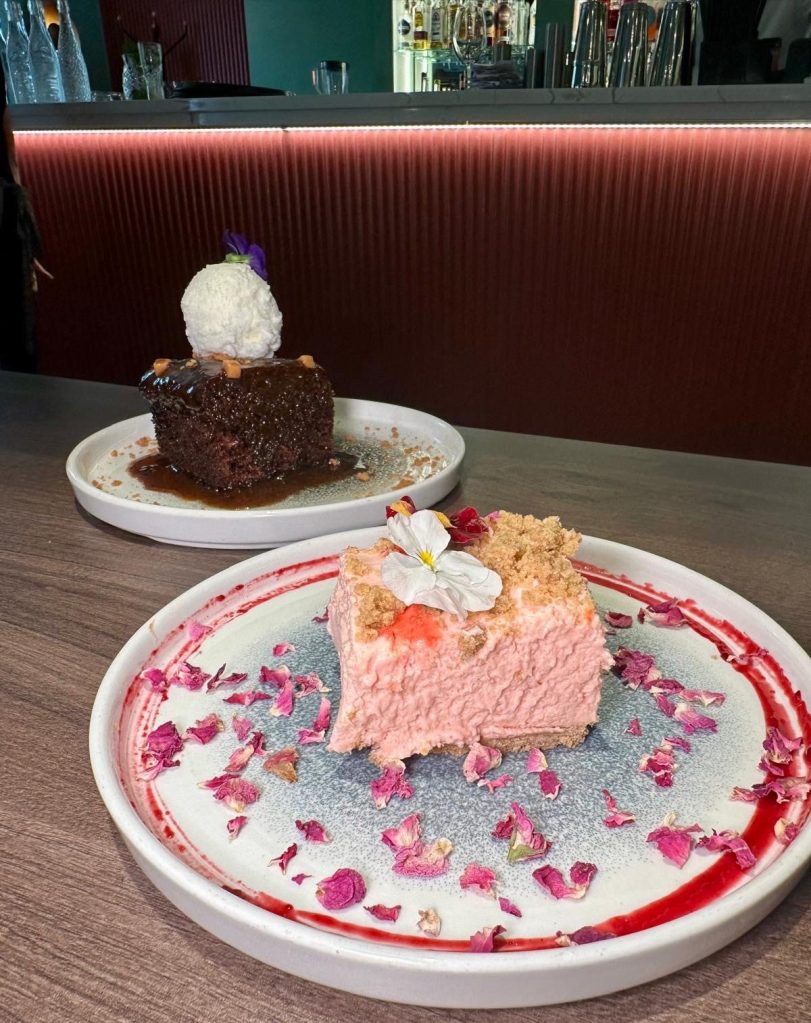 Rose and cardamom cheesecake topped with petals at Chakh Dhoom